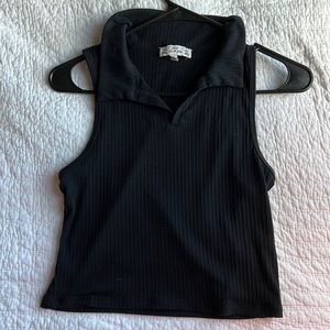 tank top in Black. Size:S